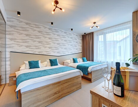 8 - Čtyřlůžkové apartmá Horizont s vířivkou