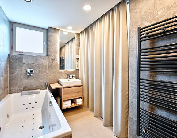 Čtyřlůžkové apartmá Horizont s vířivkou